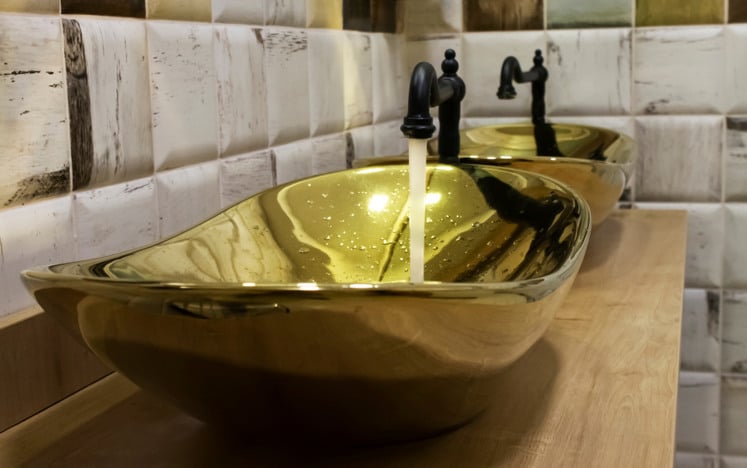 brass taps in downstairs toilet room