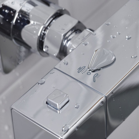 QDSHXDIVCTFFC Bristan Quadrato Safe Touch Chrome Thermostatic Rigid Riser Bar Shower Diverter Button Closeup