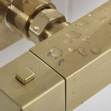 QBSHXDIVCTFFBB Bristan Qubo Thermostatic Bar Shower with Rigid Riser in Brushed Brass Diverter Handle Close Up