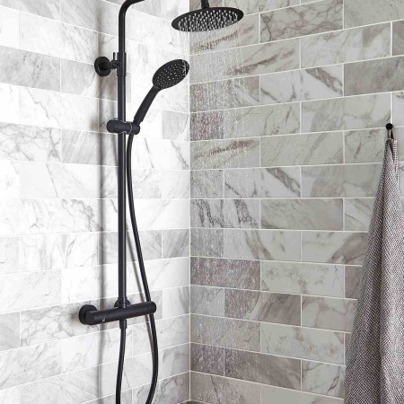 SHO052NR Kartell Nero Round Bar Shower with Drencher and Sliding Handset Room Setting