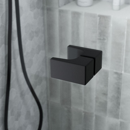 SNPR90MBK Kudos Siona 900mm Pivot Recess Shower Door in Matt Black Handle Close Up