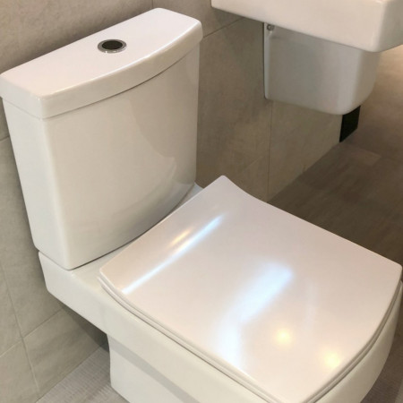 FLUSH-SENSOR Scudo Contactless Flush Sensor Installed on a Close Coupled Toilet