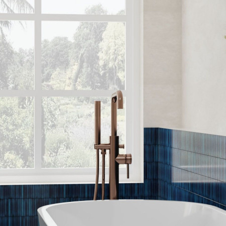 NU-041 Scudo Core Freestanding Bath Shower Mixer in Brushed Bronze Bathroom Setting