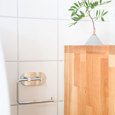 BK1097 Smedbo Beslagsboden Design Round Self Adhesive Polished Toilet Roll Holder Bathroom Setting