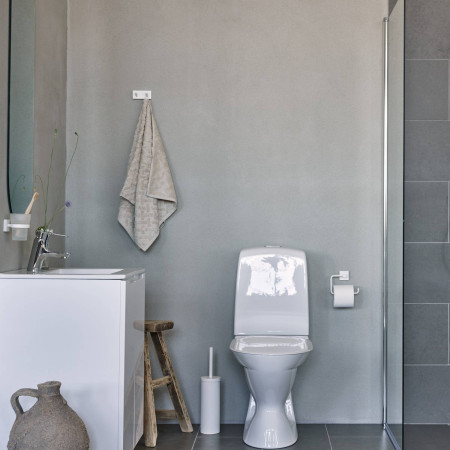 RX341 Smedbo House Toilet Roll Holder in White Bathroom Setting